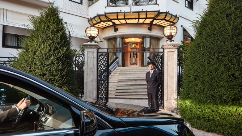 a man standing in front of a building