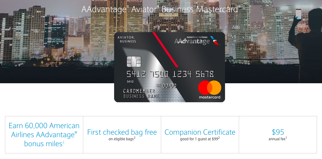 a credit card with a cityscape behind it