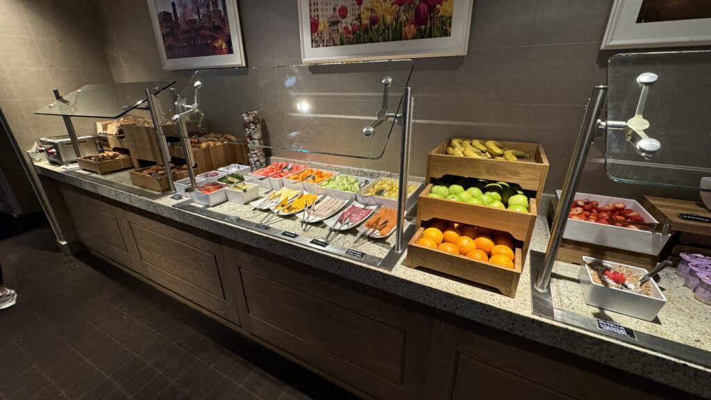 a buffet with fruit and vegetables