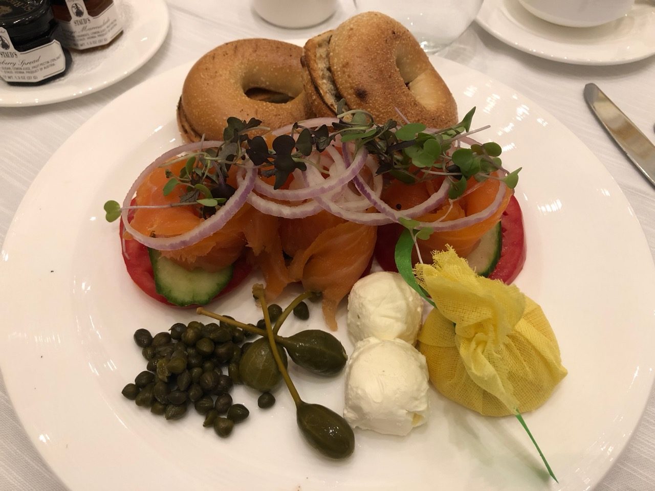 a plate of bagels and vegetables