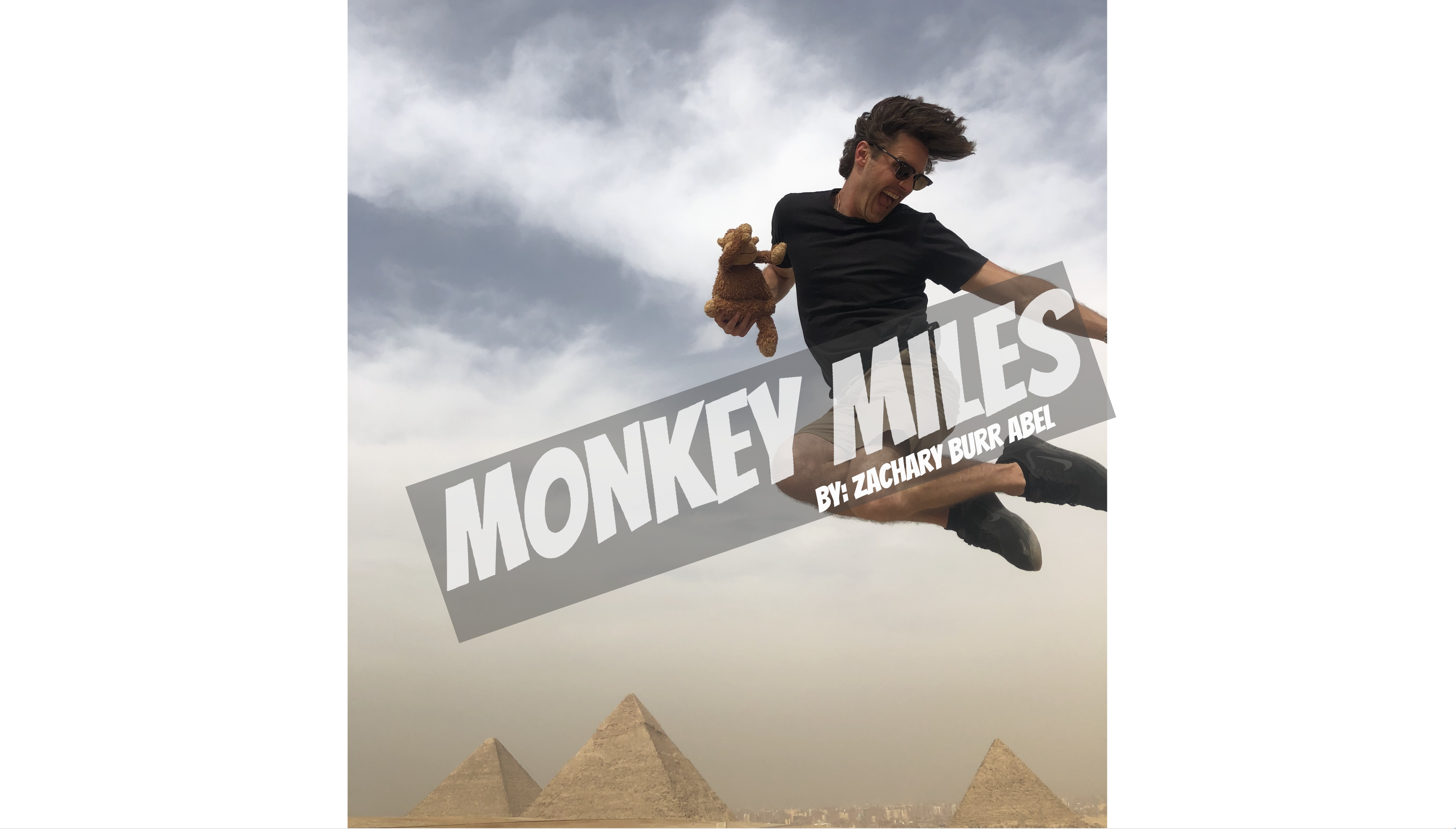 a man jumping in the air with a teddy bear and pyramids