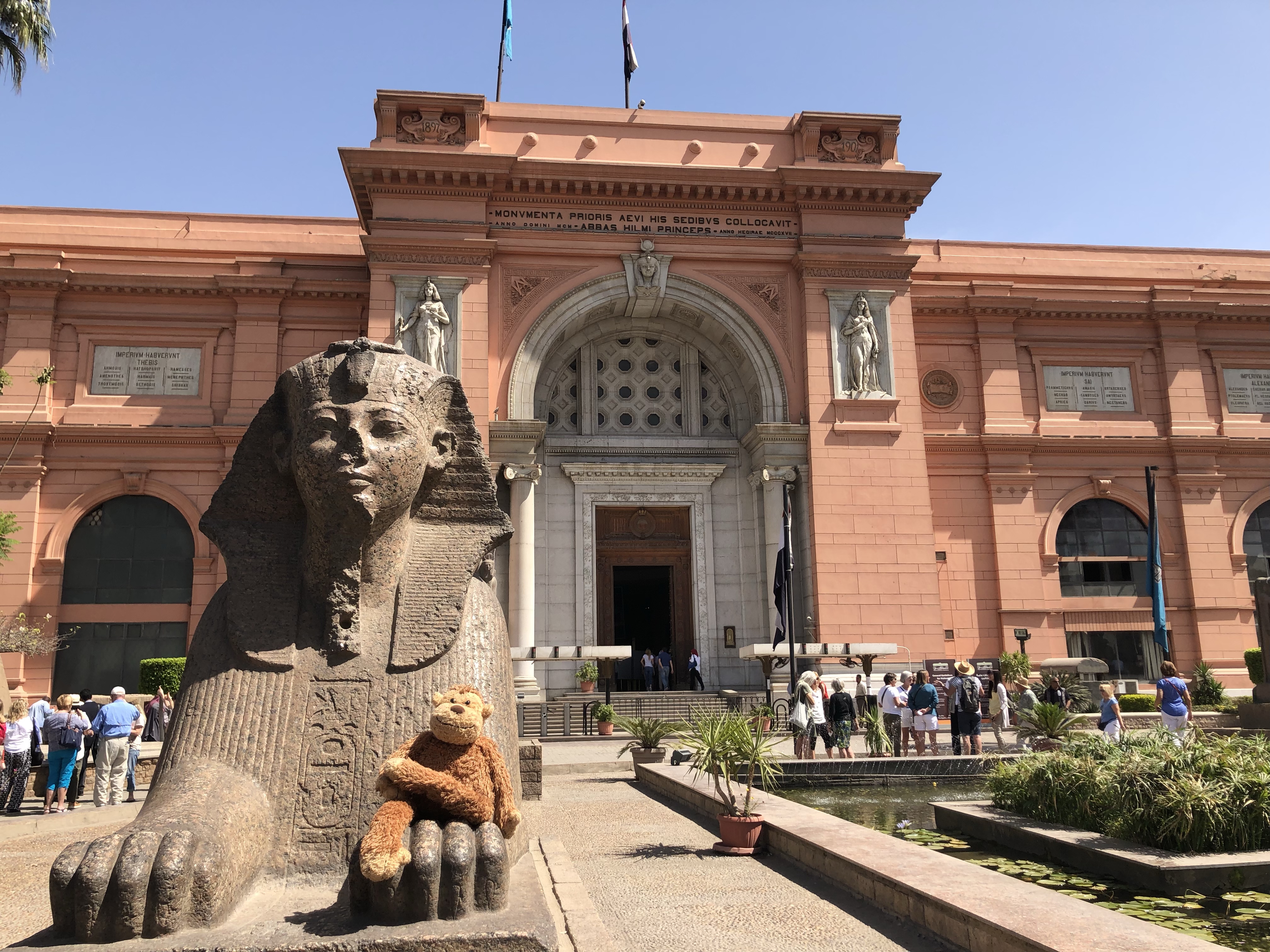 a statue of a sphinx in front of Egyptian Museum