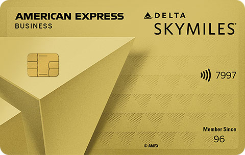 a credit card with a gold triangle design