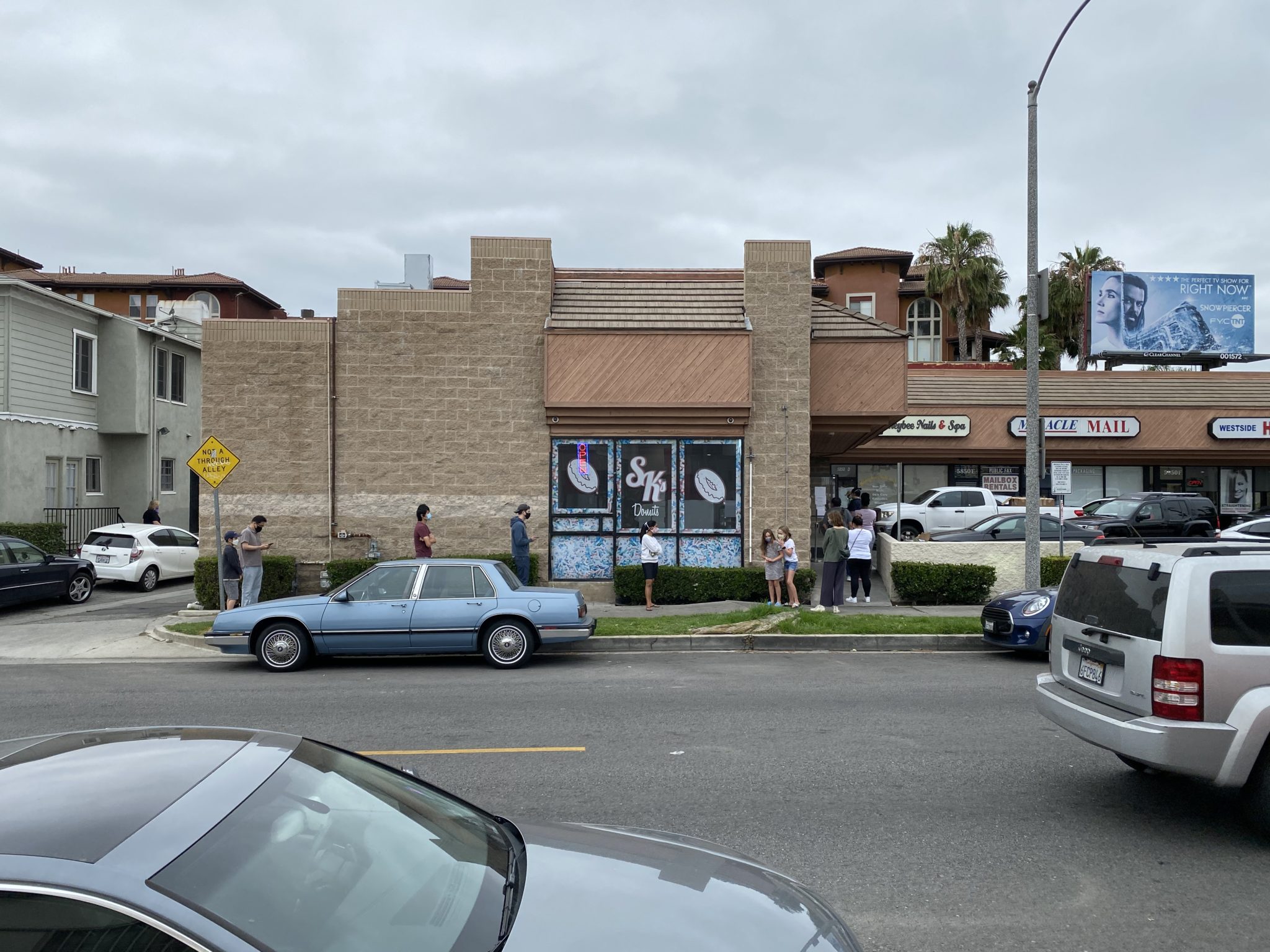 a group of people standing outside a building