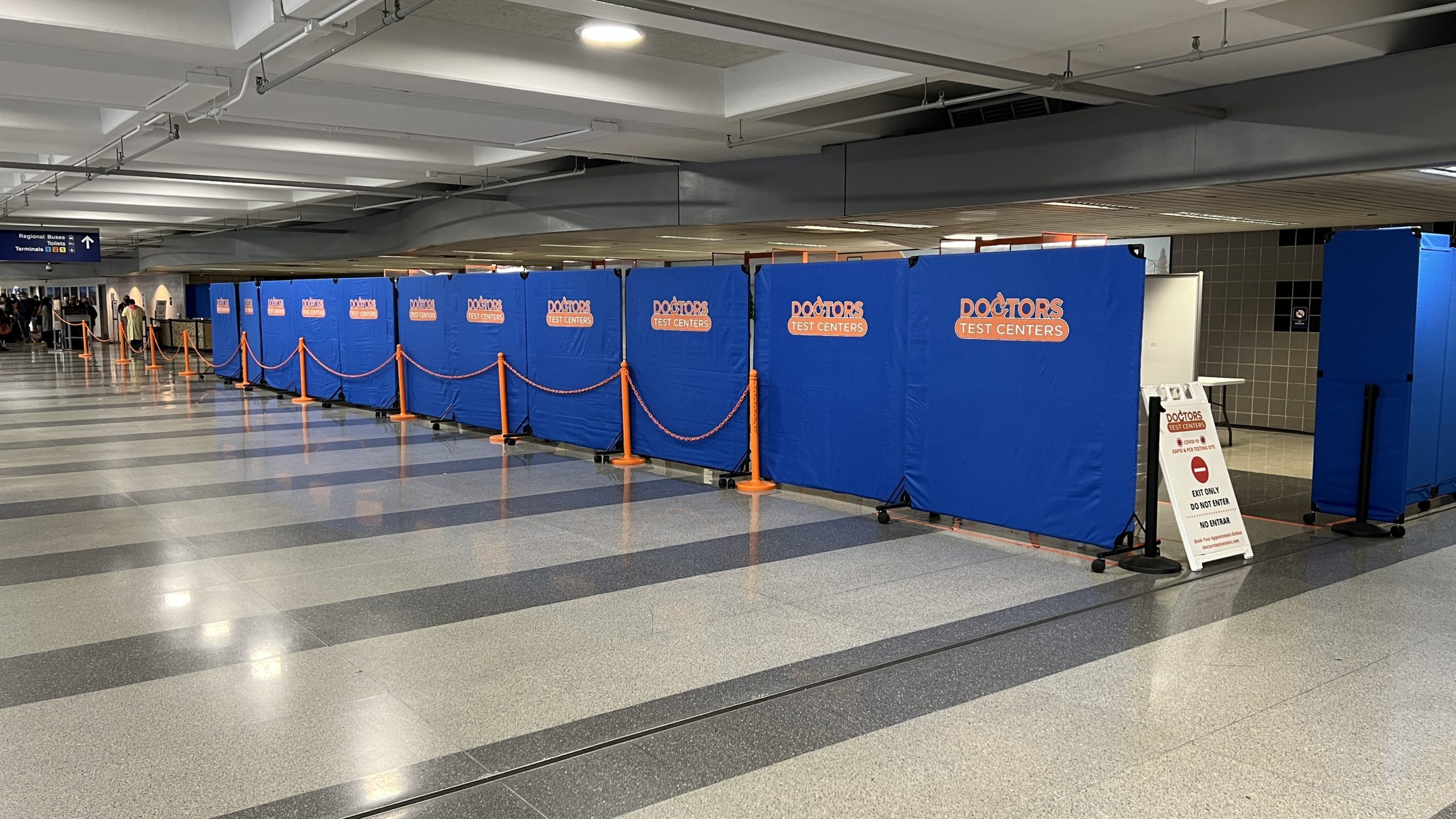 a blue and orange barriers in a room