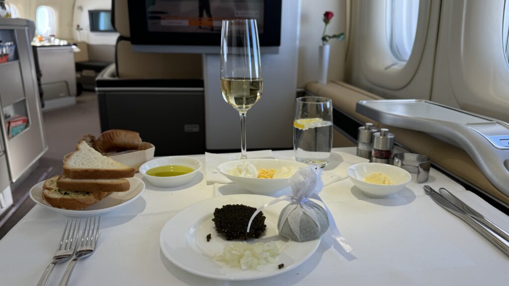 a table with food and wine glasses on it