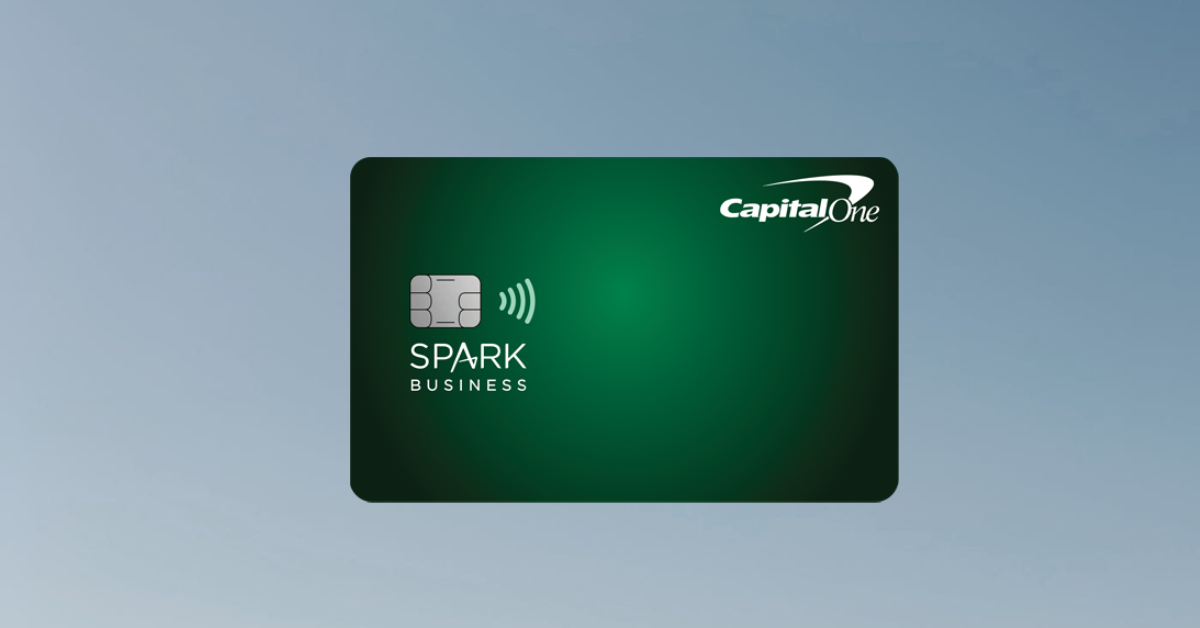 a green credit card with white text
