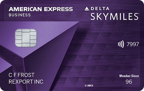 a credit card with a purple triangle design