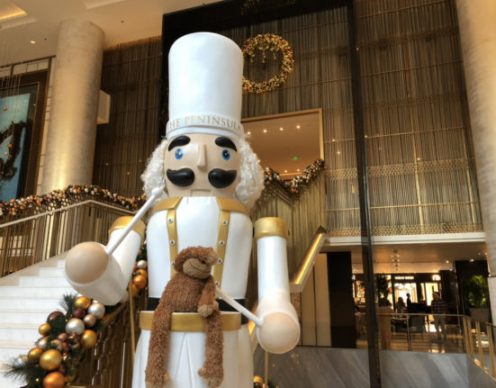 a large nutcracker statue in a building