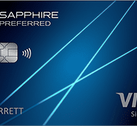 a blue credit card with blue lines and white text