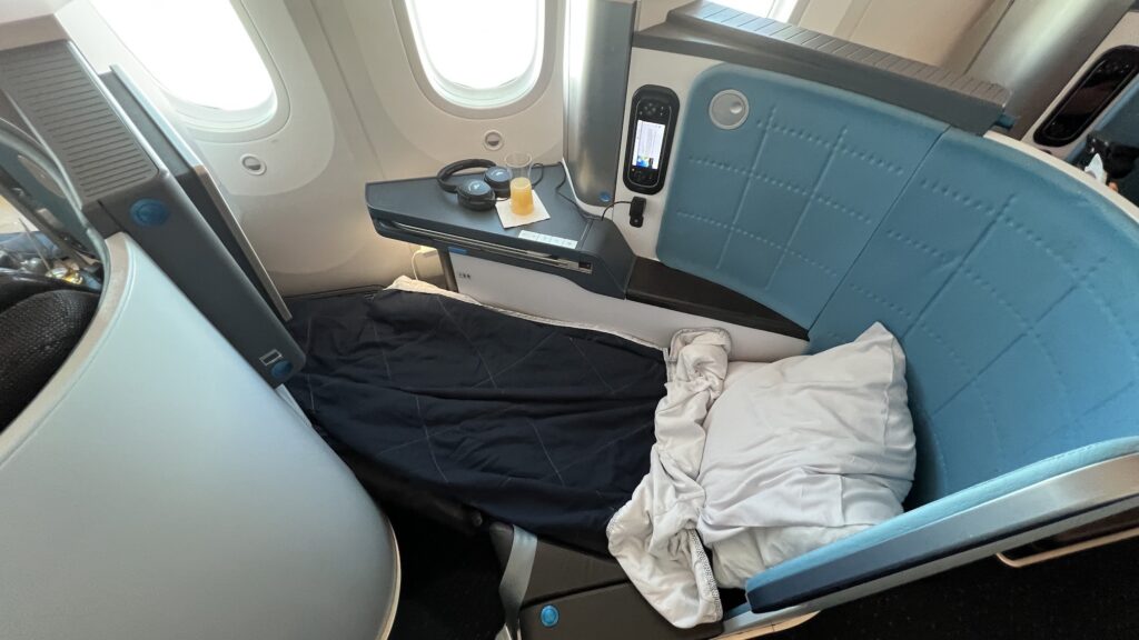 a bed in a plane