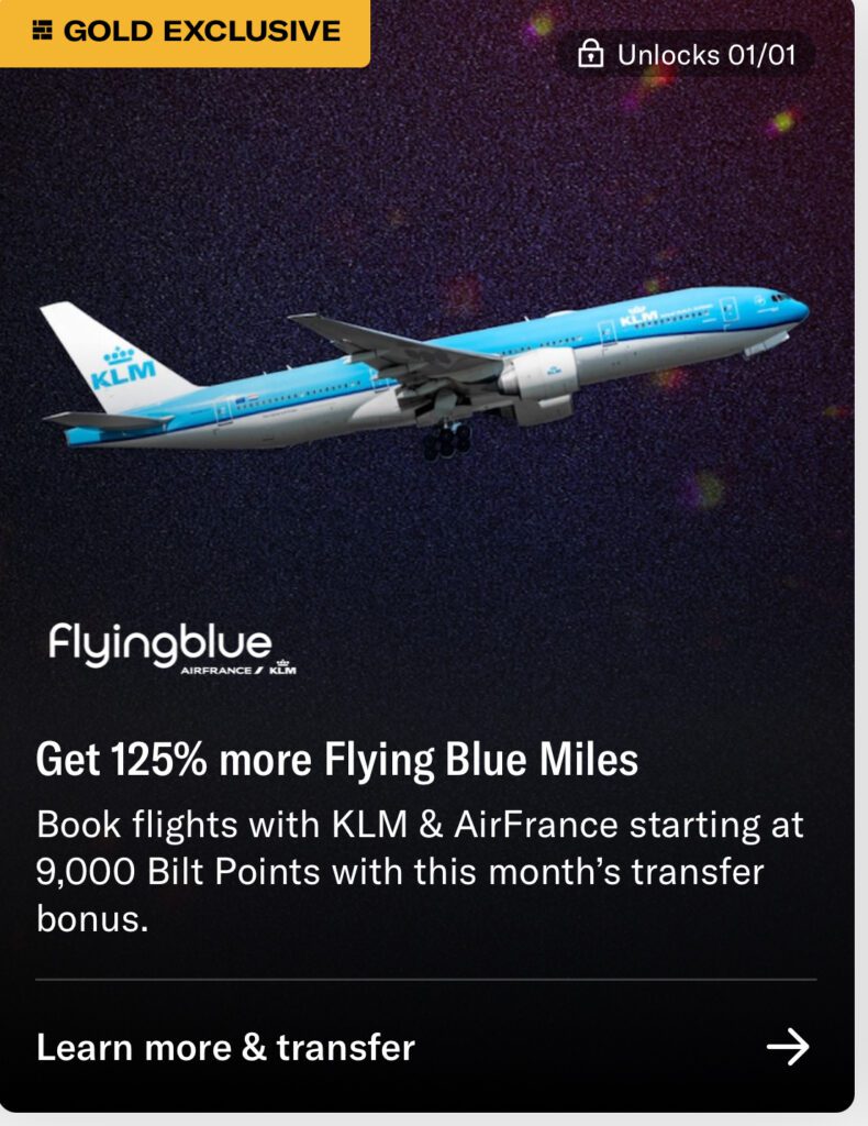 a blue and white airplane flying in the sky