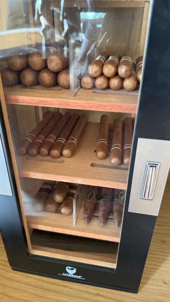 a shelf with cigars on it