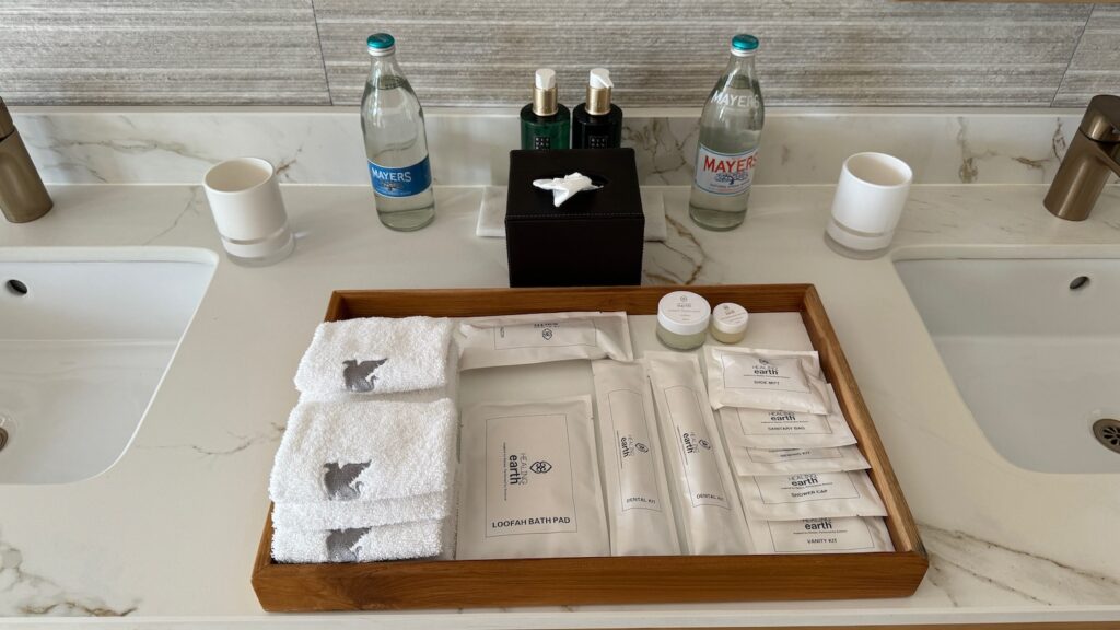 a tray of towels and other items on a counter