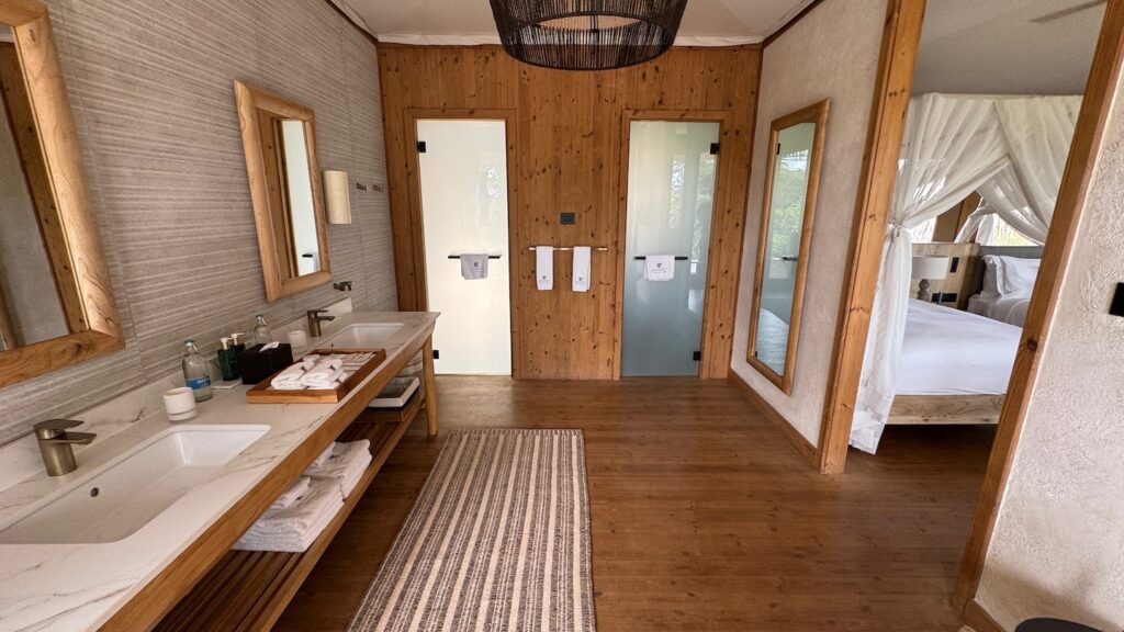 a bathroom with a wood floor and a wood floor