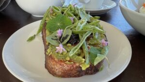 a plate of food with green vegetables on it