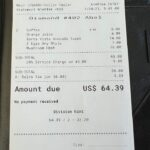 a receipt on a leather surface