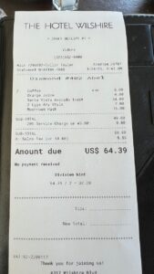 a receipt on a leather surface