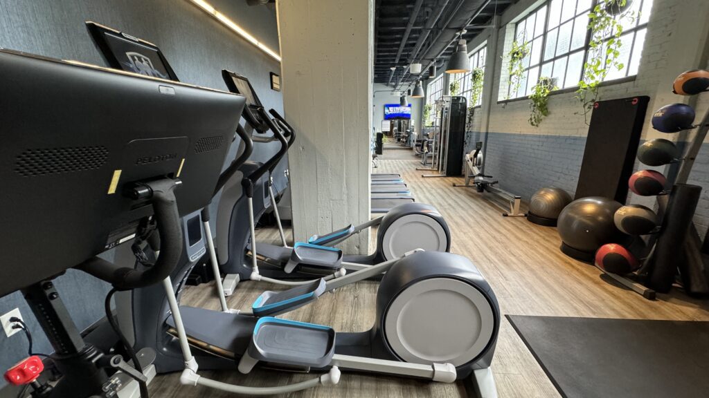 a group of treadmills in a gym