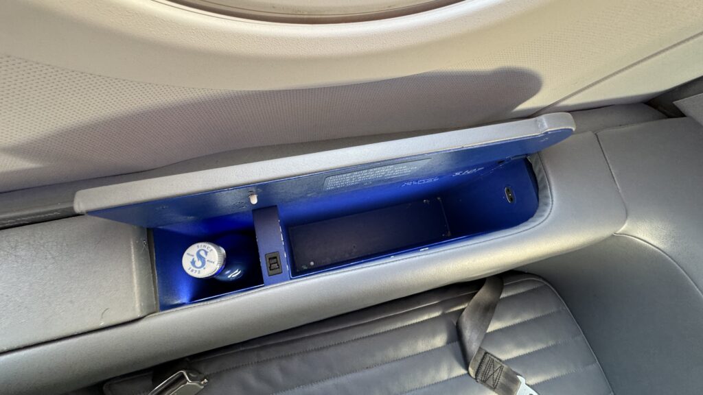 a blue and silver object in a car