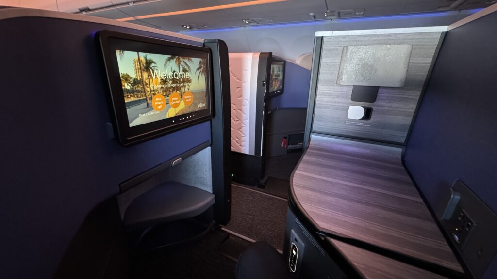 a tvs and seats in an airplane