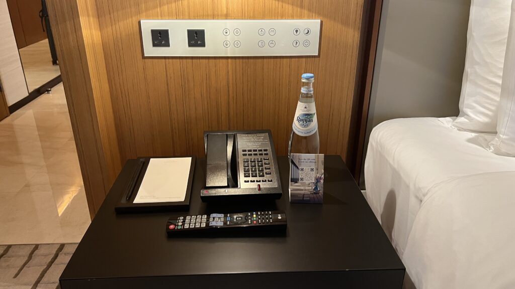 a phone and remote control on a table