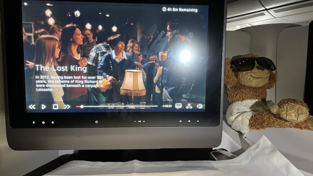 a stuffed animal in front of a television