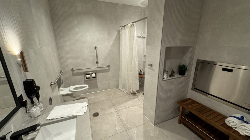 a bathroom with a shower and toilet