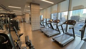 a gym with treadmills and exercise equipment