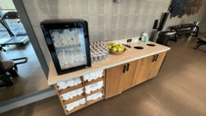 a counter with towels and fruit on it