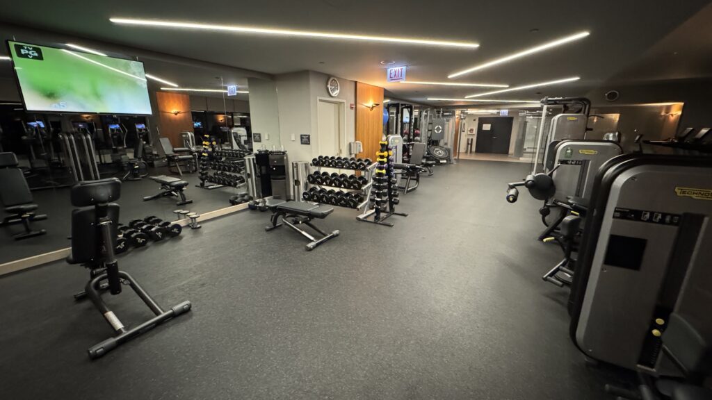 a gym with weights and equipment