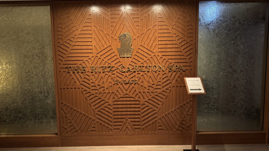 a wood panel with a sign