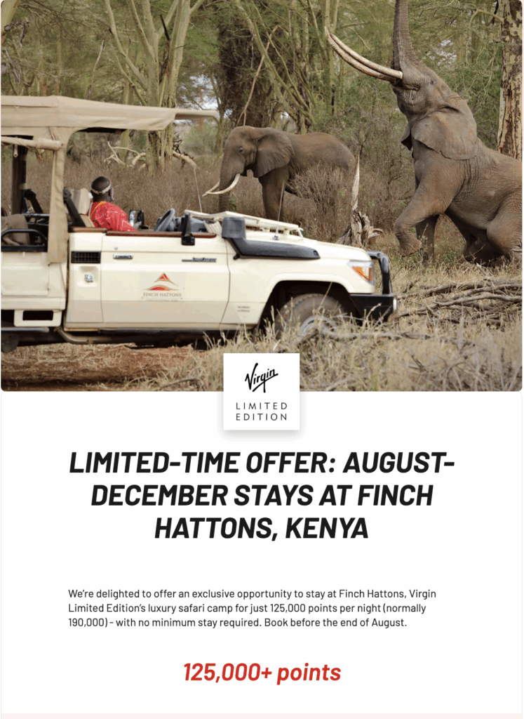 a white truck with elephants in the background