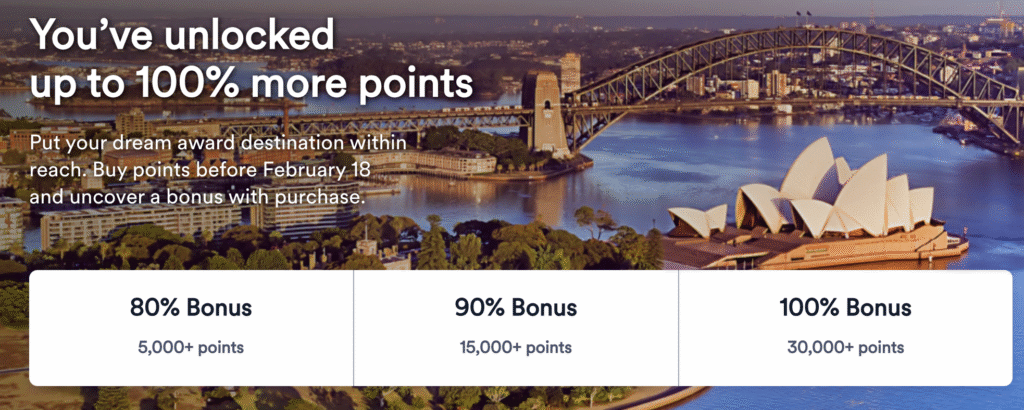 a bridge over water with buildings and trees